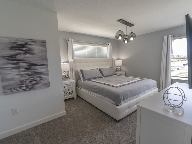 This bedroom features its own private bathroom.