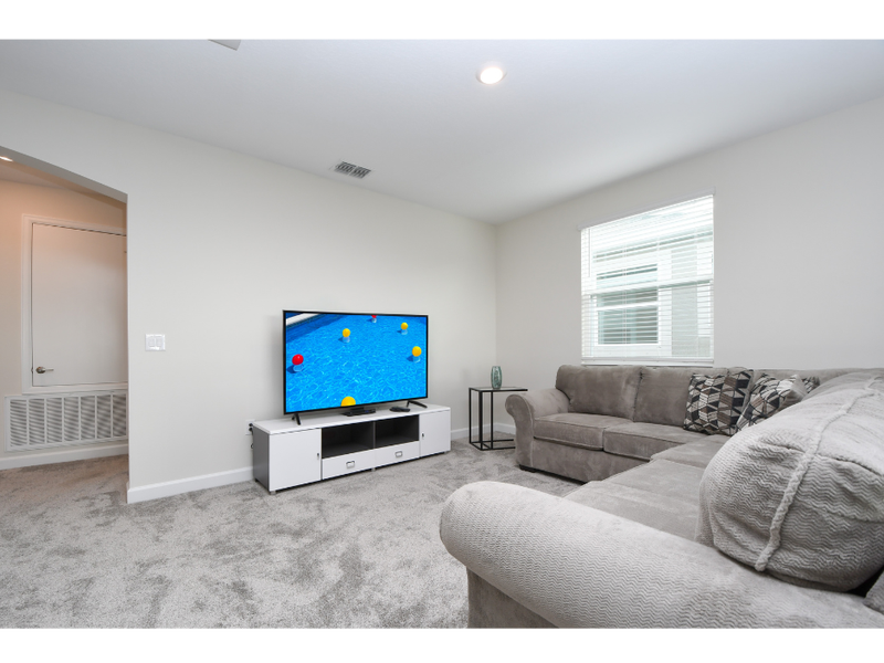 Enjoy a cozy night with ample plush seating.