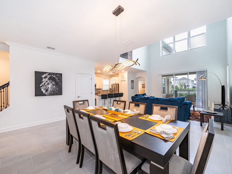 Comfortable dining room with seating for 8, plus 4 more at the kitchen bar for casual dining.