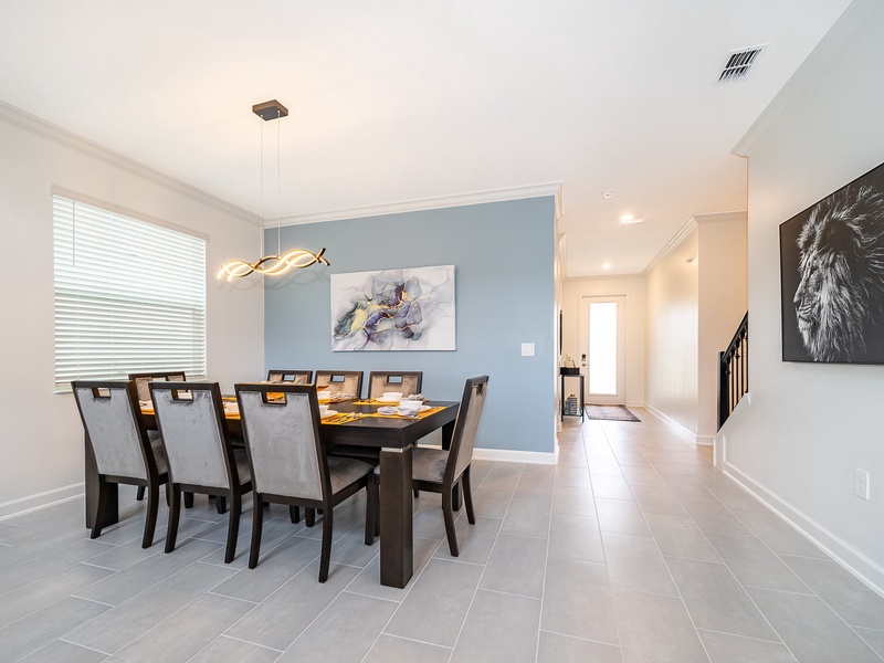 Comfortable dining room with seating for 8, plus 4 more at the kitchen bar for casual dining.