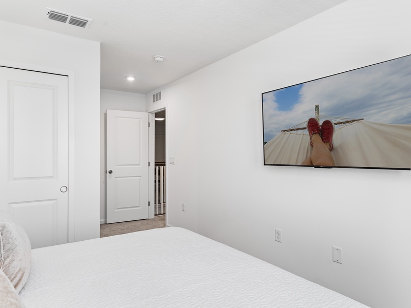 Each bedroom comes with its own TV and closet space for your convenience.
