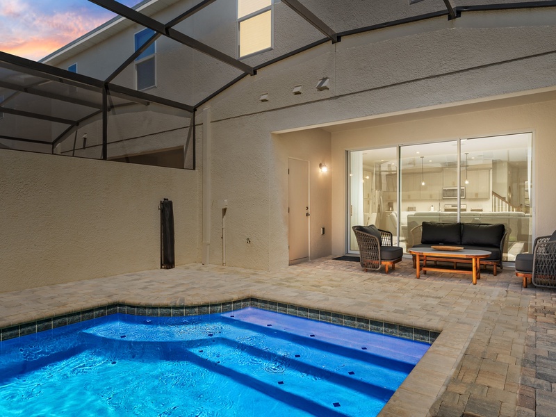 Enjoy lovely evenings outside by the private pool.