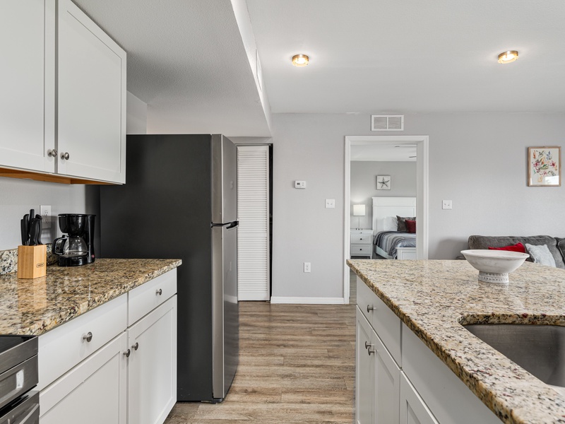 Fully equipped kitchens featuring stainless steel appliances.