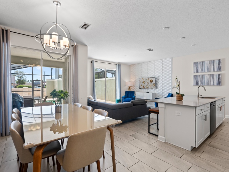 Our dining area comfortably seats up to 8 guests, with 4 additional seats available at the kitchen island.
