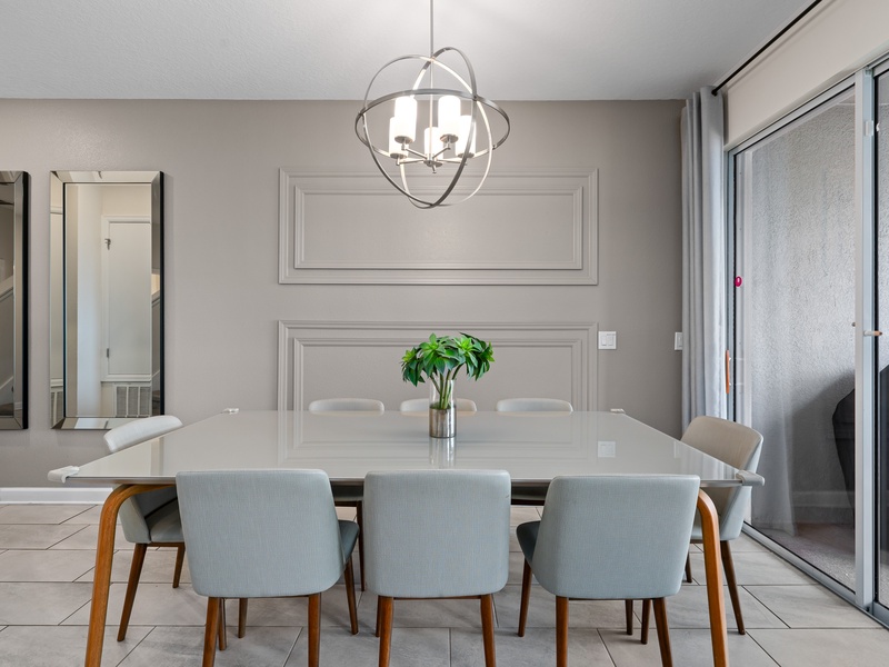 Our dining area comfortably seats up to 8 guests, with 4 additional seats available at the kitchen island.