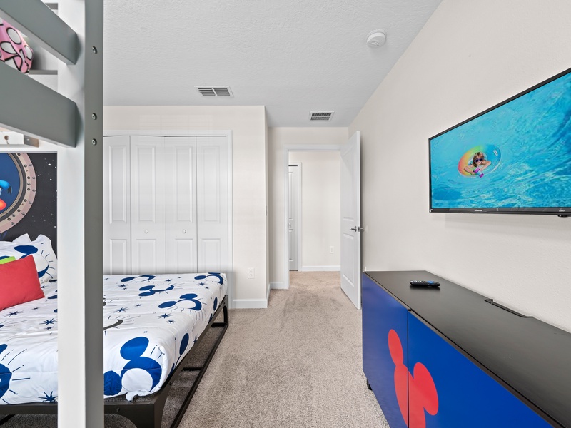 Each bedroom is equipped with its own TV and ample closet space for your convenience.