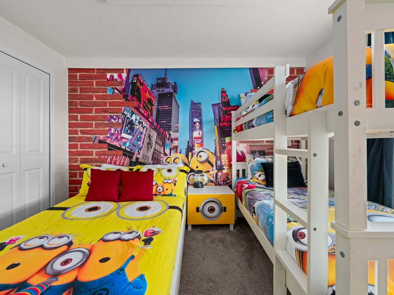 The children's room features comfortable accommodations with a full shared bathroom for added convenience.