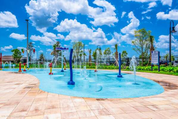 Let your children enjoy at the splash pad while you relax by the sun lounges.