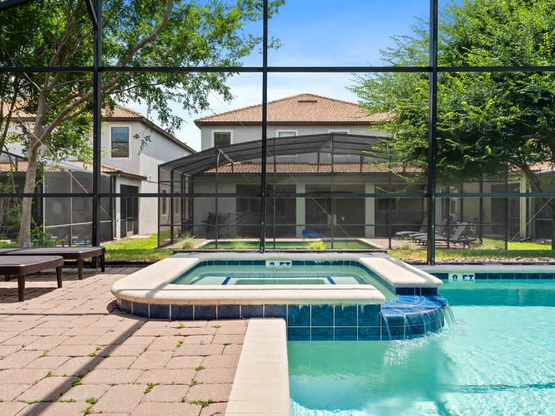 Soak up the sun by your private pool, pure relaxation just steps away.