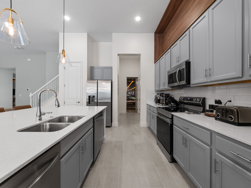 Our kitchen is fully equipped with stainless steel appliances with everything you need to get ready for the day.
