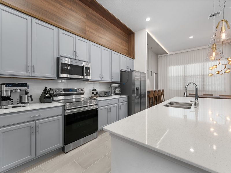 Our kitchen is fully equipped with stainless steel appliances with everything you need to get ready for the day.