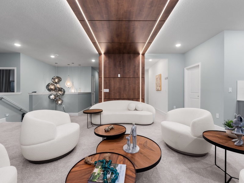 Enjoy movie nights or catch the game in this stylish upstairs lounge, complete with a large smart TV and plenty of seating for everyone.