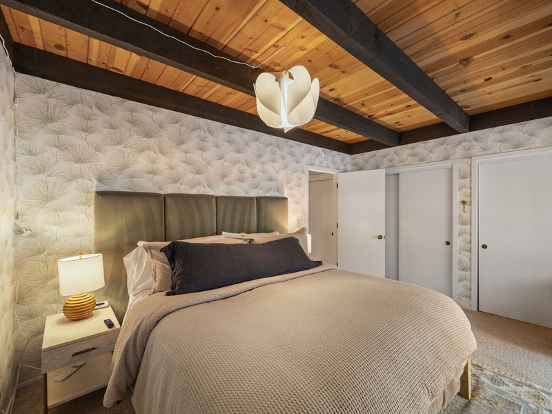 The primary bedroom offers playful colors and textures