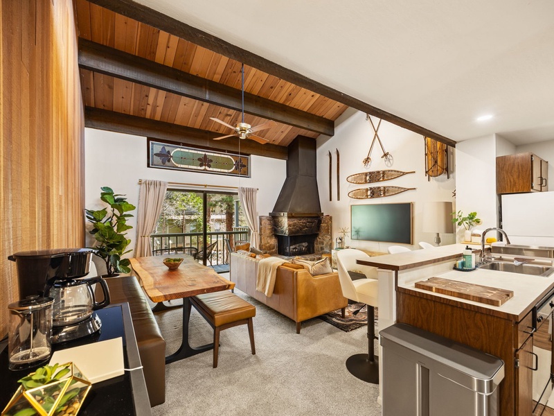 The main living area is tastefully decorated with a mix of modern and rustic finishes