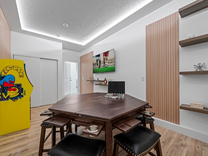 Enjoy some friendly competition in our cozy game room, a nice  space to relax and play with family and friends.