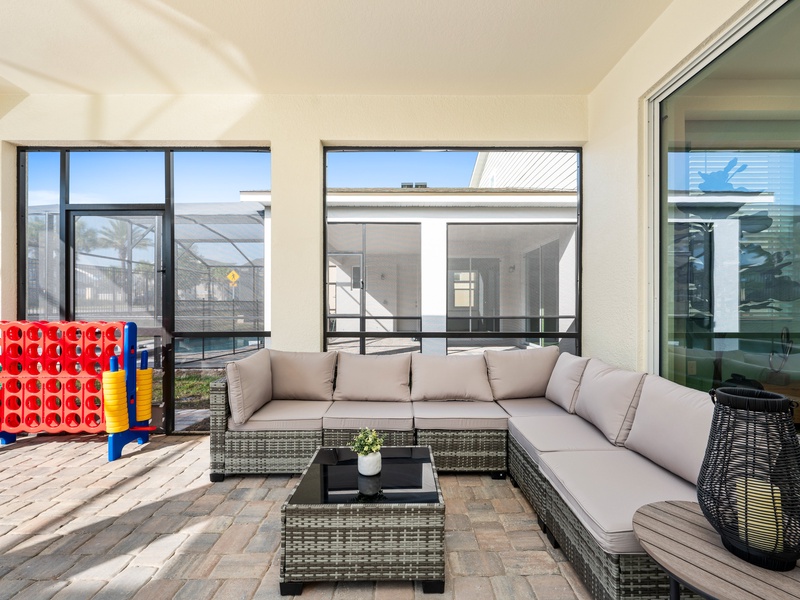 Unwind by the private pool at night in your cozy outdoor living room.