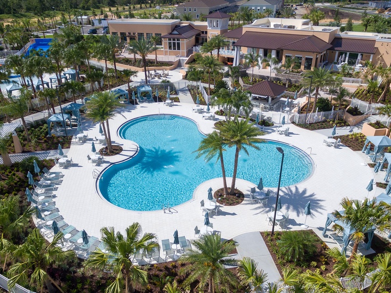 Bask in the sun by Solara Resort's stunning pool, complete with cabanas, splash zones, and tropical vibes.