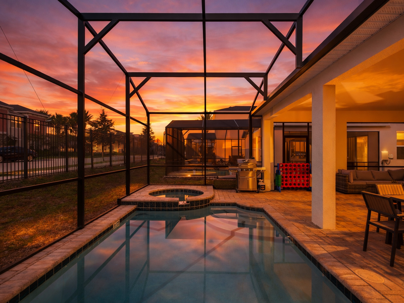 Enjoy beautiful Florida sunsets from the outdoor patio by your private pool.