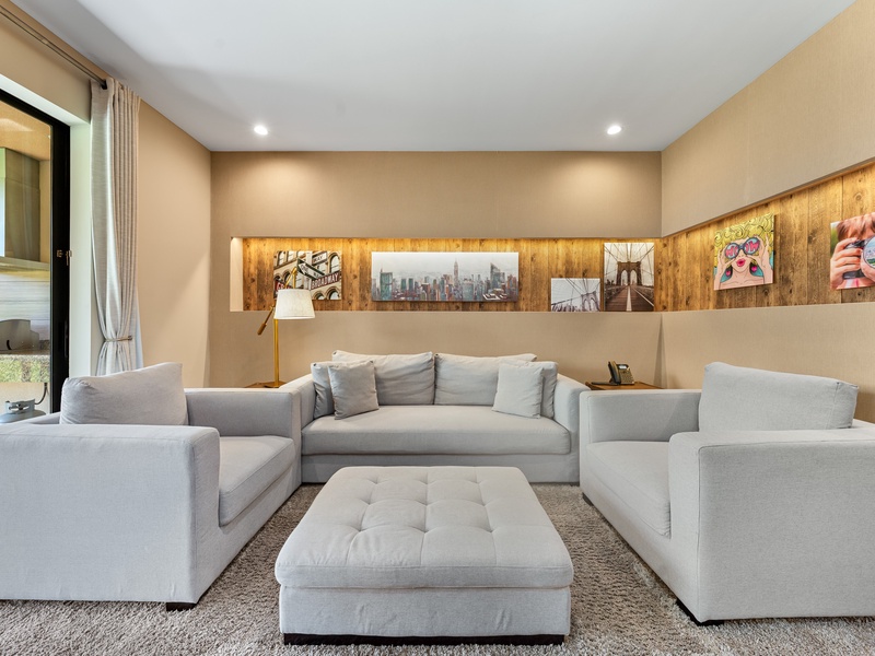 Unwind and enjoy cozy family time by the indoor fire pit, perfect for creating warm memories after a day at the parks.