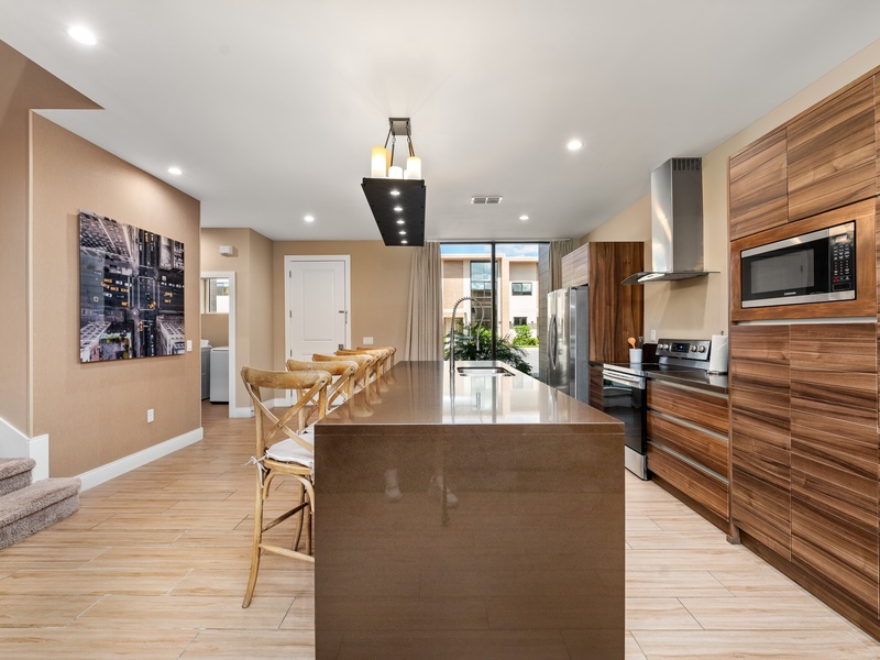 Our kitchen is fully equipped with new stainless steel appliances, cookware, and utensils, perfect for preparing your favorite meals during your stay.