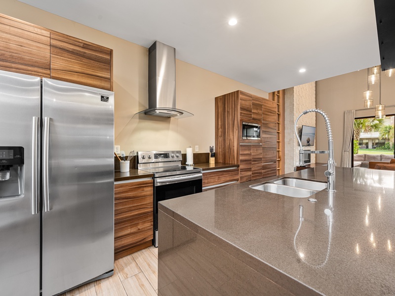 Our kitchen is fully equipped with new stainless steel appliances, cookware, and utensils, perfect for preparing your favorite meals during your stay.