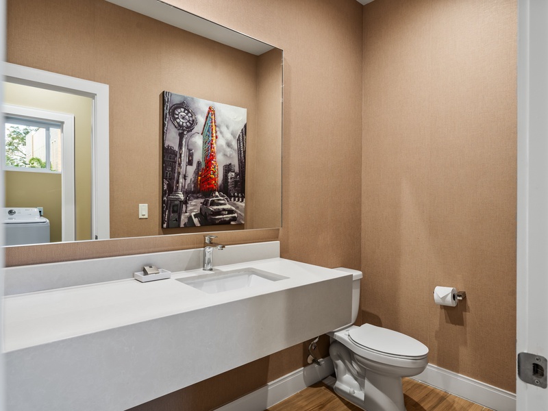 There is one half bathroom downstairs, perfect for added convenience during gatherings or movie nights.