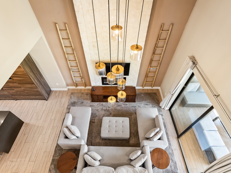 Unwind and enjoy cozy family time by the indoor fire pit, perfect for creating warm memories after a day at the parks.