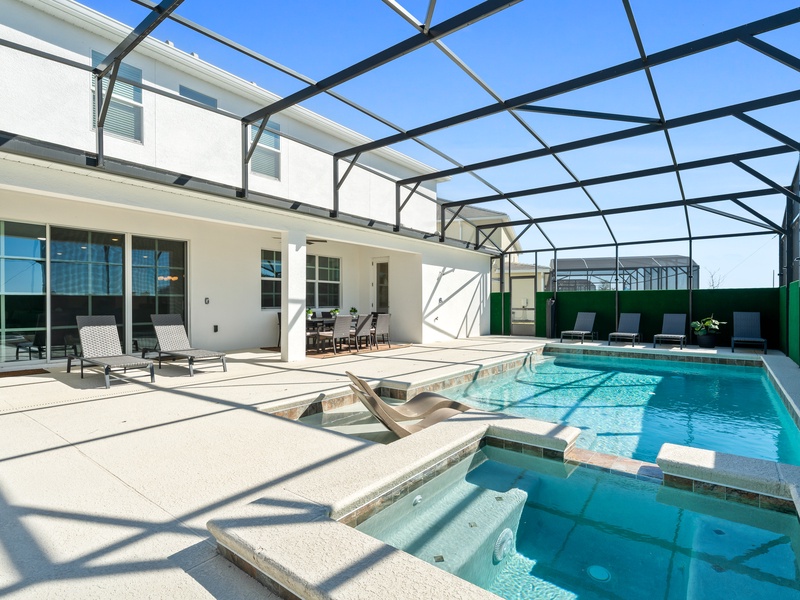 Enjoy our outdoor oasis featuring an alfresco dining area, outdoor kitchen with BBQ grill, and private pool perfect for unforgettable evenings!