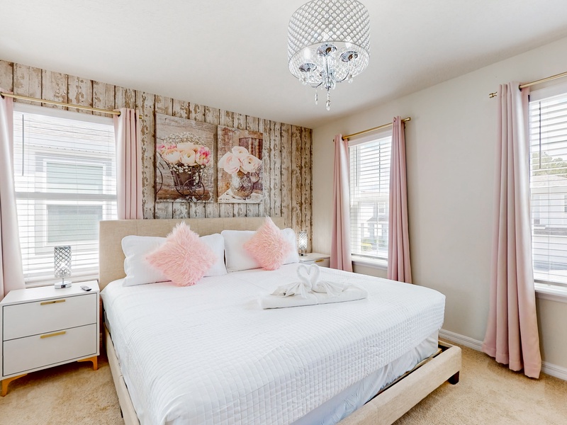 2nd floor Secondary King bedroom with private ensuite & TV.  Located at the front of the home.