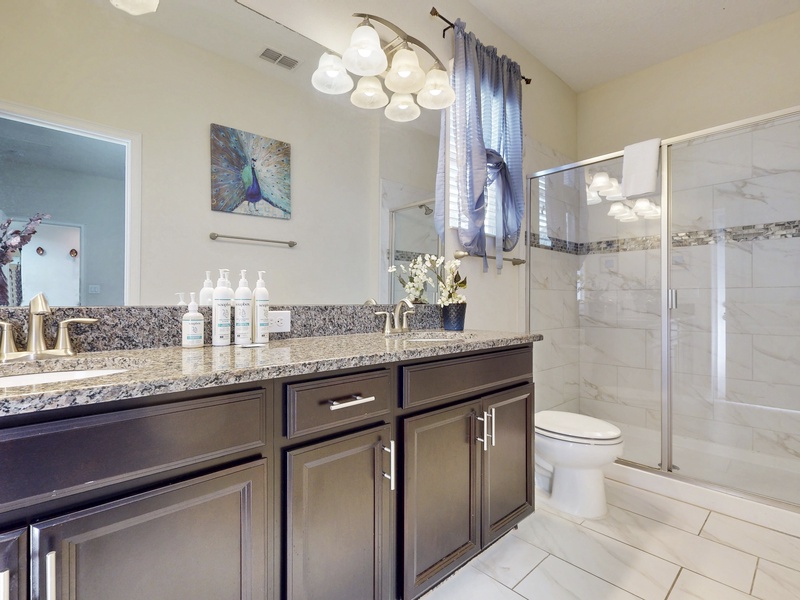 Convenient bathroom space helps everyone get ready with ease.