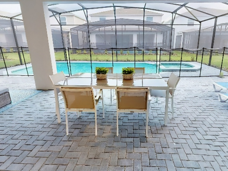 Covered Lanai dining area with seating for 6