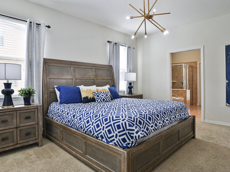 Bedroom #2 - King bedroom, 1st floor with TV and private ensuite that has access to the lanai.