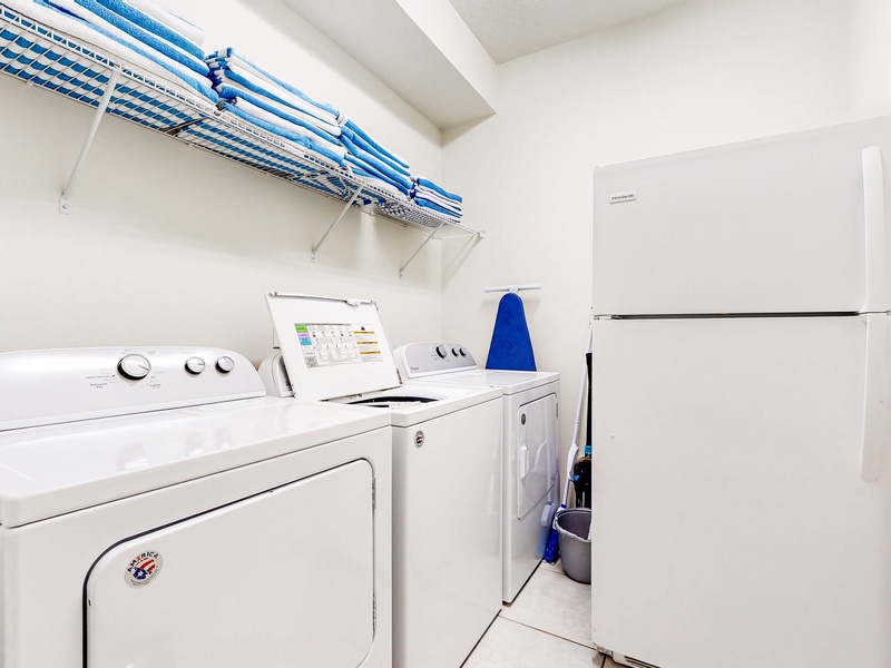 1st floor laundry room with 1 washer & 2 dryers