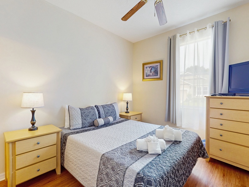 Bedroom #1 - Queen bed in the front of the home with TV & private ensuite