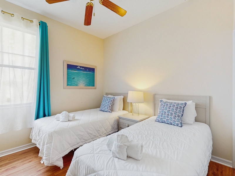 Bedroom #2 - 2 twin beds with TV on side of home