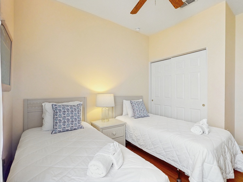 Bedroom #2 - 2 twin beds with TV on side of home
