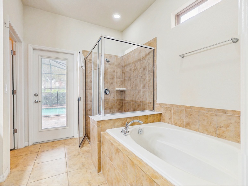 Bedroom #1 ensuite with soaking tub and walk in shower