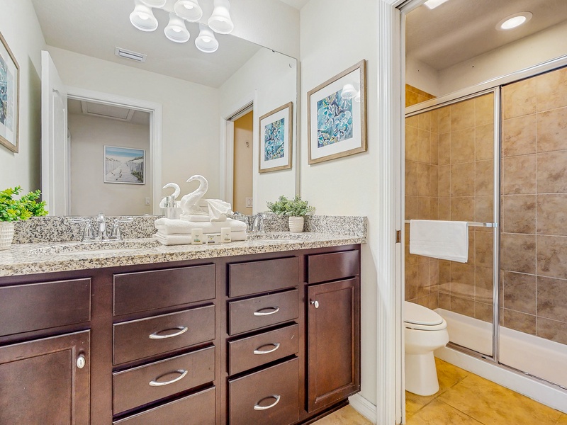 Shared 2nd floor bathroom between Bedroom 3 & Bedroom #4 with double sink vanity, toilet & walk in shower