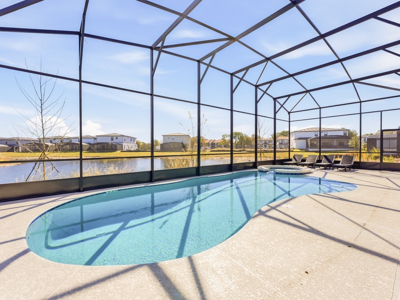 Lounge in luxury by the pool with stunning water views, fire up the grill, and unwind around the cozy fire pit, all from the comfort of your private oasis.