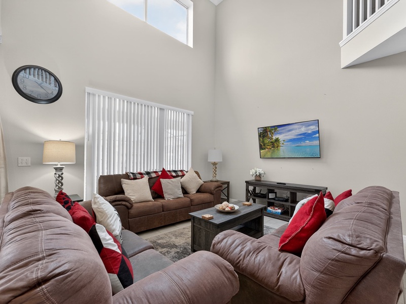Enjoy a cozy movie night with plush, comfortable seating.