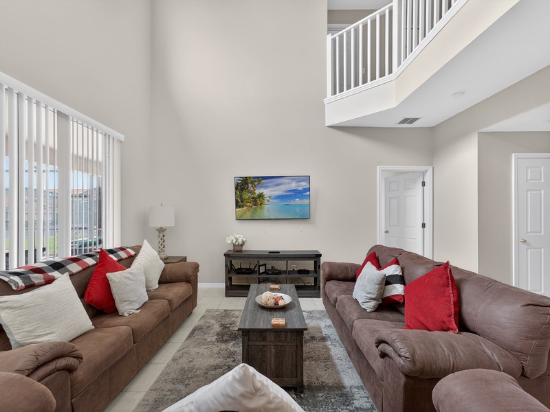 Enjoy a cozy movie night with plush, comfortable seating.