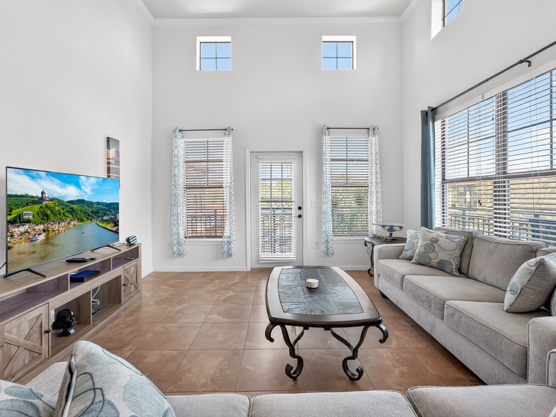 Condo filled with natural sunlight, creating a bright and airy atmosphere.