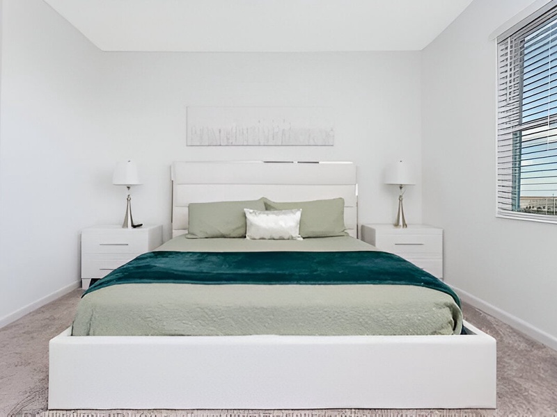 Relax in style: comfortable master bedroom with full private bathroom and access to the balcony/terrace.
