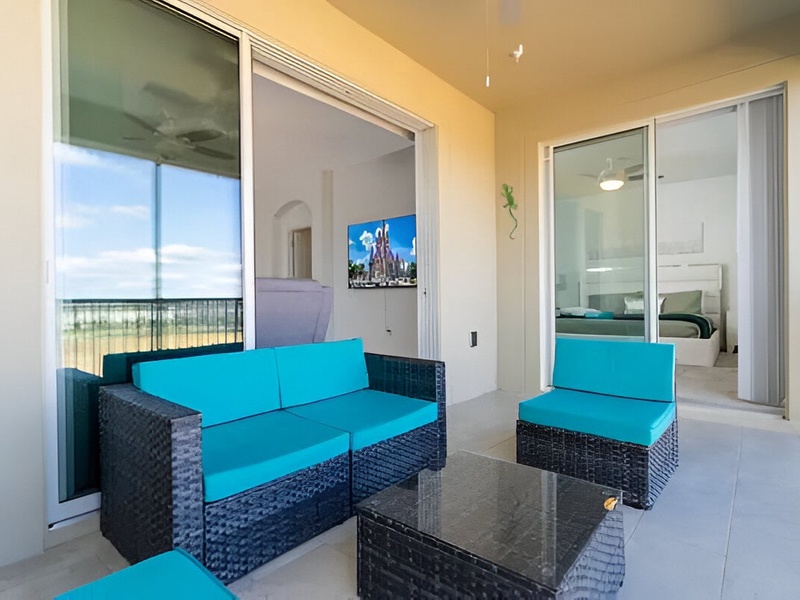 Enjoy comfortable seating and ample natural light in the balcony where you can relax while taking in fresh air and beautiful views.