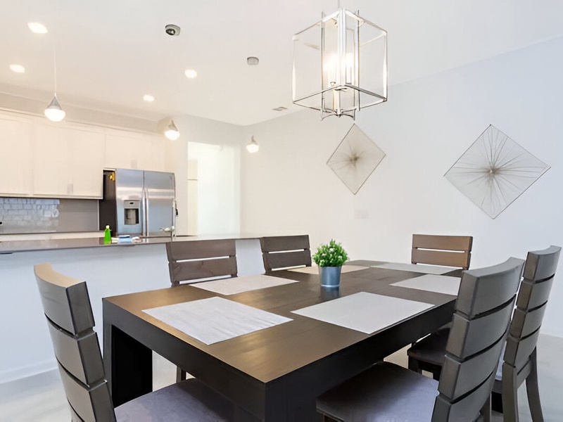 Dine in comfort in a six-seat dining table in open-concept living area.