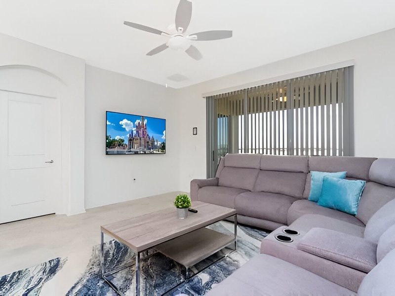 Flat-screen TV in the living.room, perfect  for cozy movie nights with family and friends.