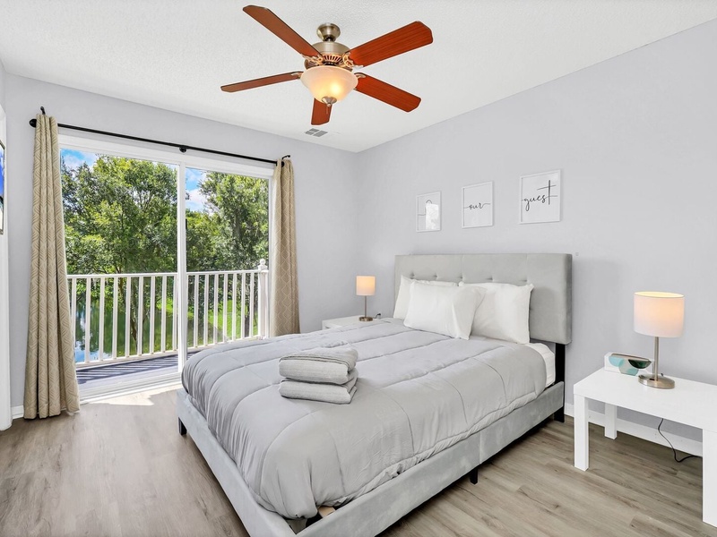 Our master bedrooms feature a balcony with a beautiful view of the resort's lake, a private bathroom, closet and a TV.
