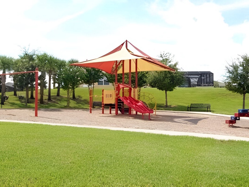 Let your children enjoy at the playground while you relax by the pool.