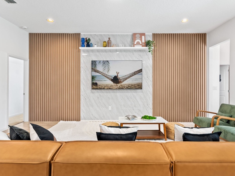 Enjoy a cozy movie night with ample plush seating designed for your comfort.