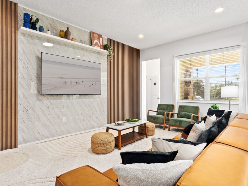 Enjoy a cozy movie night with ample plush seating designed for your comfort.